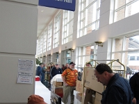 Ken Tremel is working hard to get all the people into the hall ASAP